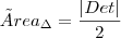 {Área}_{\Delta} = \frac{|Det|}{2}